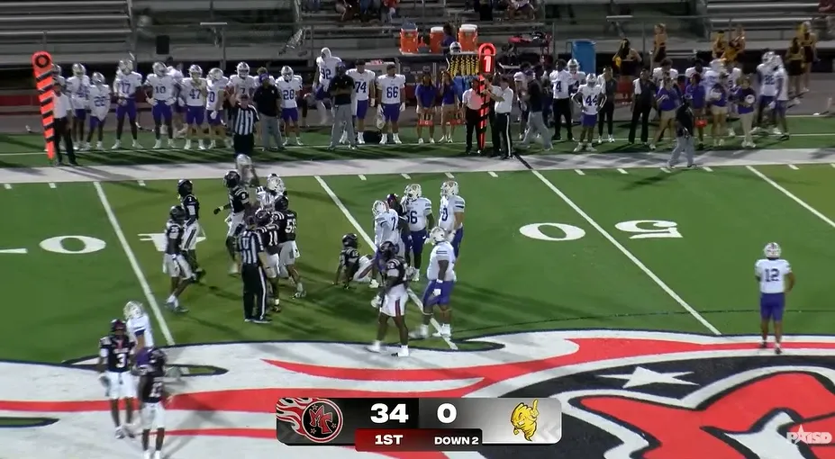 Previous scorebug on the stream: team logos, score 34–0, and "1ST · DOWN 2"